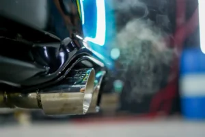 close up of the exhaust pipe emitting smoke from a 2024 12 05 11 37 19 utc